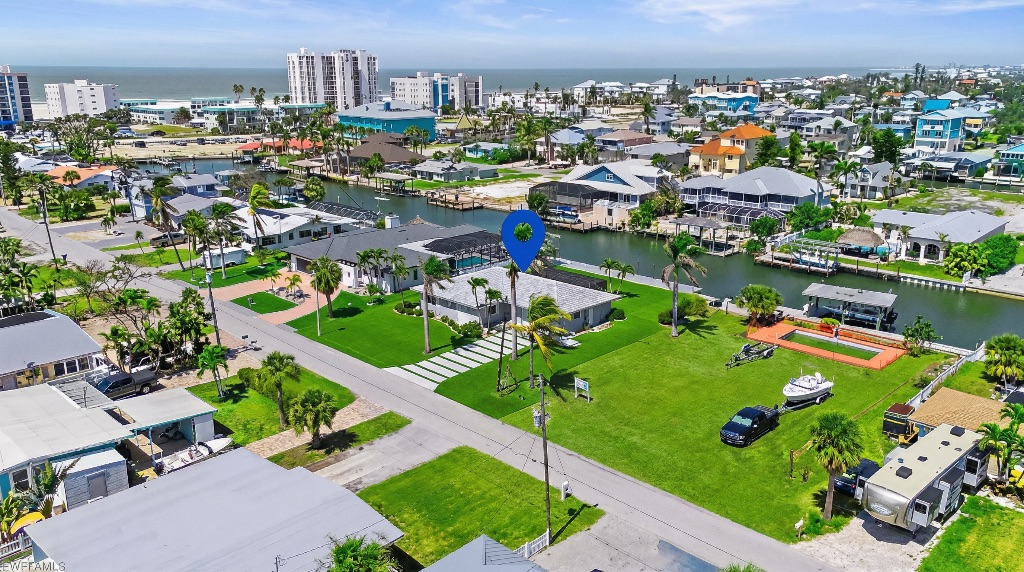Estero Escape waterfront estate aerial view with canal access Fort Myers Florida