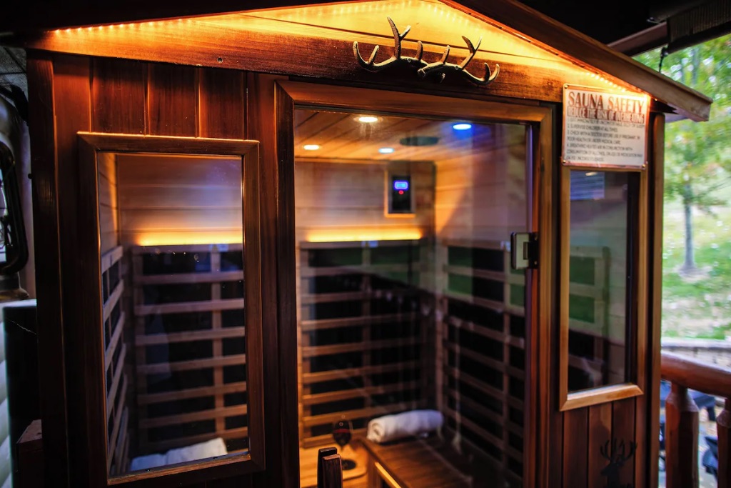 Pigeon Hills infrared sauna with wood interior antler decor and ambient lighting