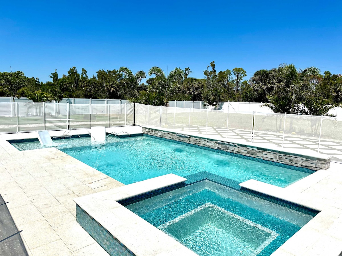 Seaside Boca Key West style exterior with tropical landscaping