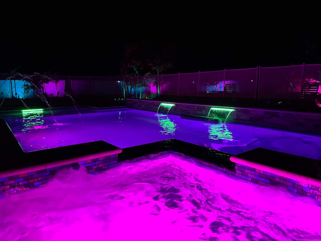 Seaside Boca resort pool with LED lighting at night