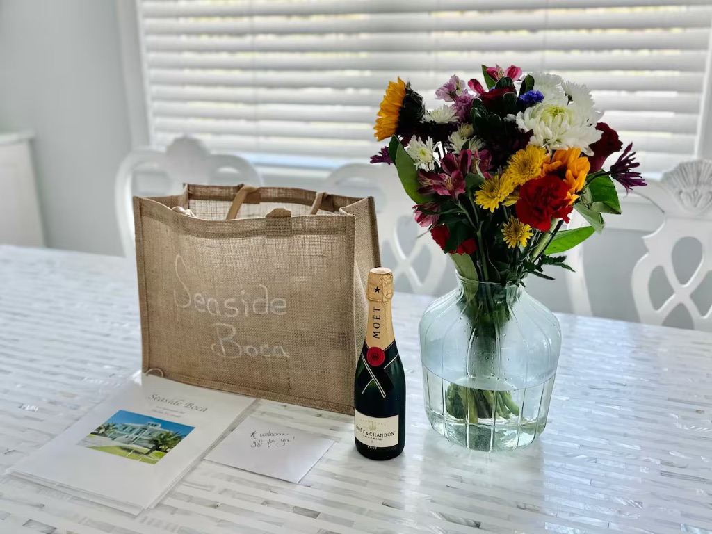 Seaside Boca welcome amenities with champagne and flowers