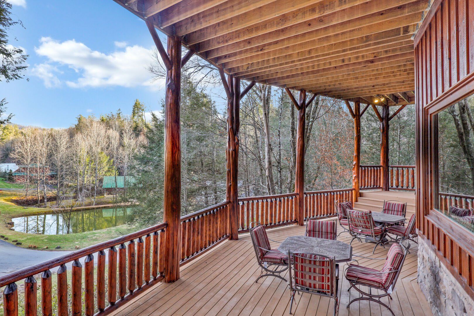 Waters Edge Lodge wraparound deck with mountain views
